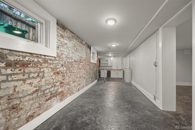 3410 Pecos St, Denver, CO 80211 - basement featuring brick wall