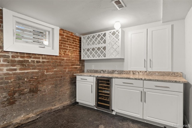 3410 Pecos St, Denver, CO 80211 - indoor dry bar featuring beverage cooler and brick wall