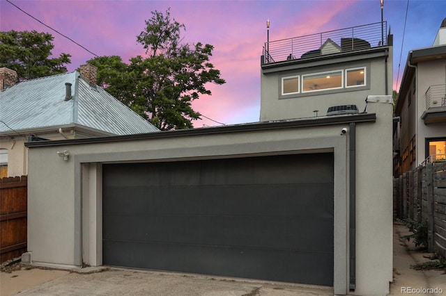 3410 Pecos St, Denver, CO 80211 - view of garage at dusk