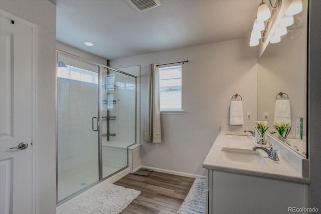 4505 Cholla Trl, Castle Rock, CO 80104 - full bath featuring plenty of natural light, a stall shower, double vanity, and a chandelier