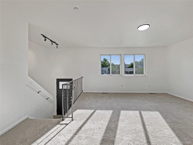 12238 Monroe Dr, Thornton, CO 80241 - unfurnished room featuring carpet floors and rail lighting