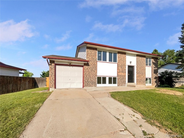 12238 Monroe Dr, Thornton, CO 80241 - bi-level home featuring brick siding, an attached garage, and concrete driveway