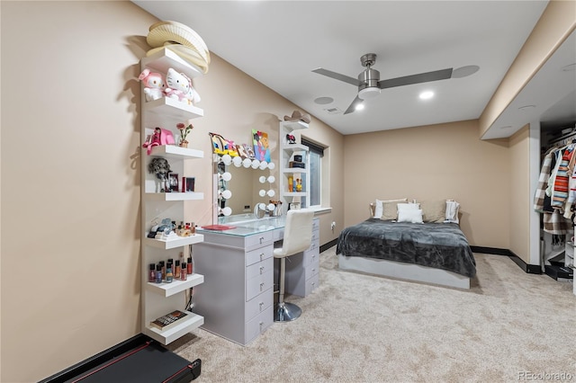 bedroom with light carpet and ceiling fan