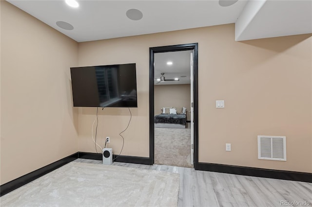 bedroom with light hardwood / wood-style flooring