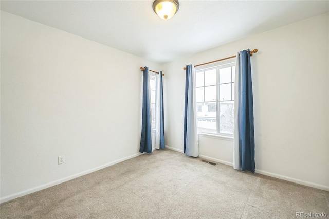 view of carpeted spare room