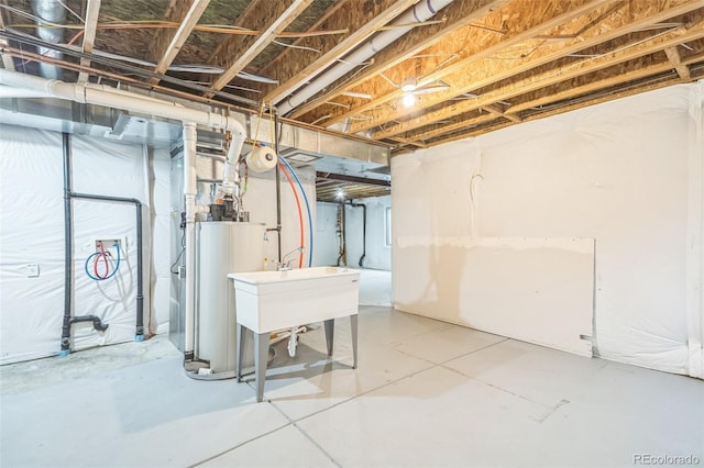 basement featuring gas water heater