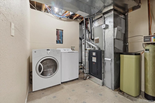 laundry area featuring laundry area and washing machine and clothes dryer