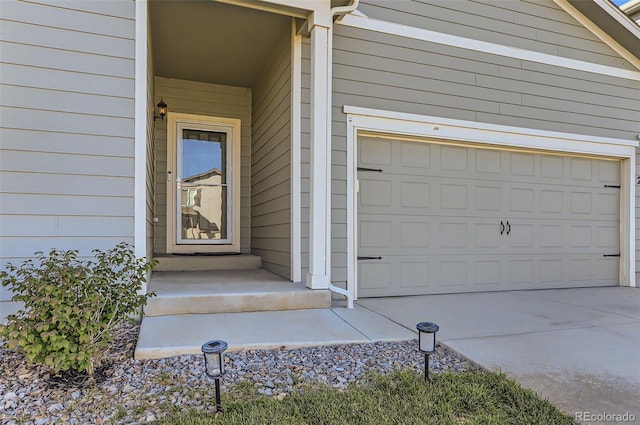 entrance to property featuring a garage