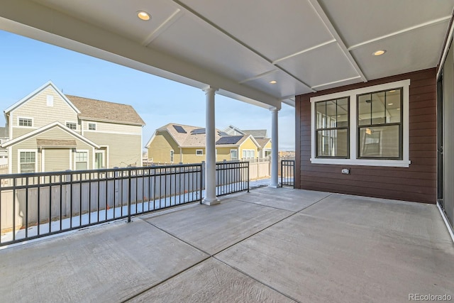 view of patio with a residential view