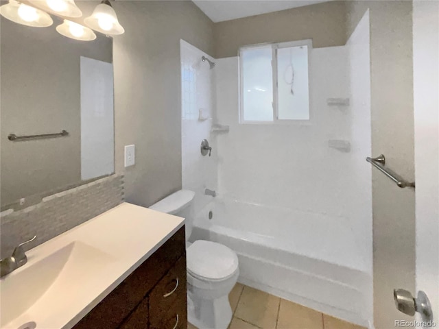 full bathroom featuring vanity, toilet, tile patterned floors, and tub / shower combination