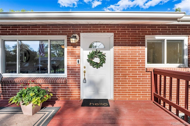 6506 Lee St, Arvada, CO 80004 - doorway to property with brick siding