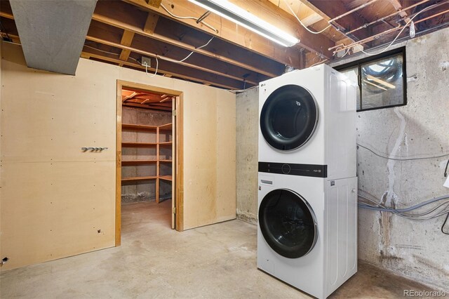 6506 Lee St, Arvada, CO 80004 - laundry area featuring stacked washer and clothes dryer