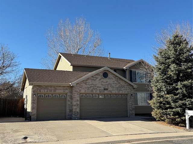 view of front of property with a garage