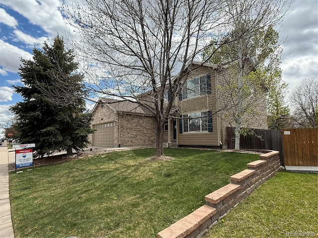 13031 Dexter St, Thornton, CO 80241 - view of yard featuring an attached garage