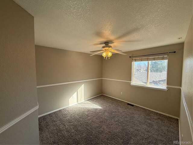 13031 Dexter St, Thornton, CO 80241 - carpeted empty room featuring ceiling fan, a textured ceiling, and baseboards