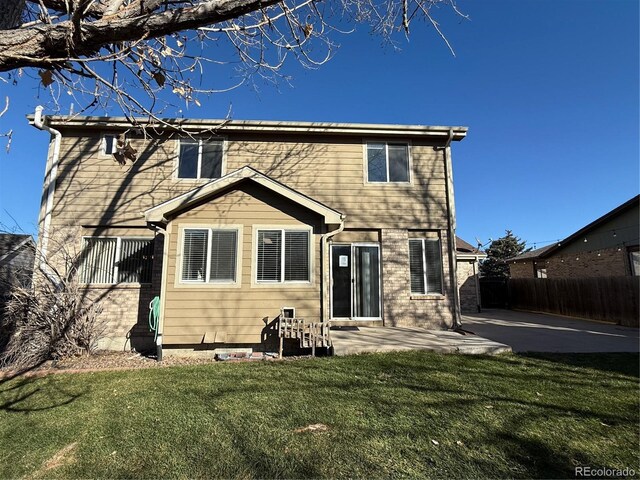 13031 Dexter St, Thornton, CO 80241 - back of house featuring a patio area