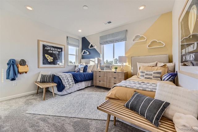 carpeted bedroom featuring recessed lighting, visible vents, and baseboards