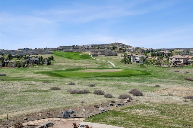 view of home's community featuring golf course view