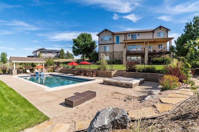 view of pool featuring a patio area, a fenced in pool, fence, and an outdoor structure