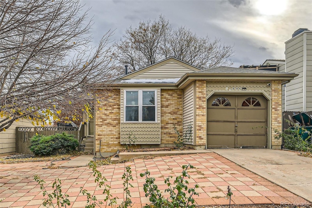 view of front of home with a garage