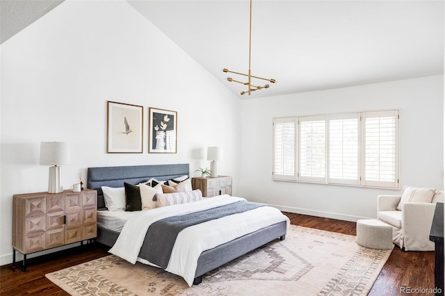 bedroom with high vaulted ceiling, a chandelier, and dark hardwood / wood-style floors