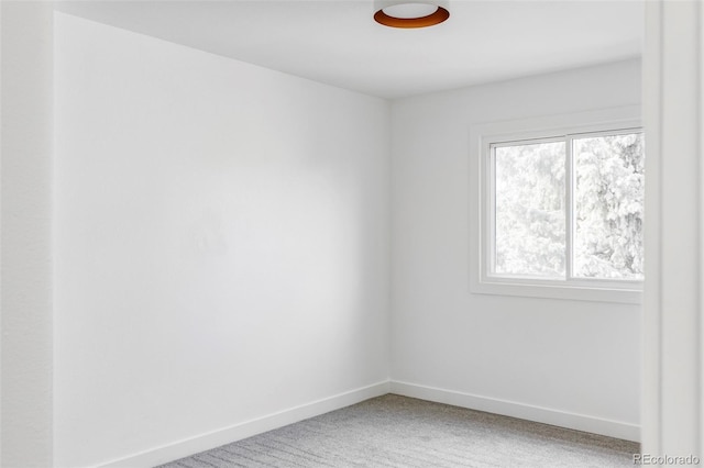 empty room featuring carpet flooring