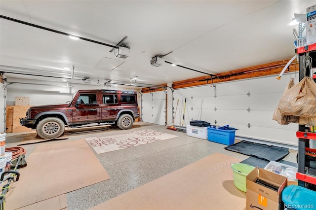 garage featuring a garage door opener