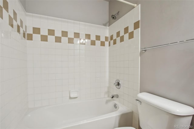 bathroom featuring  shower combination and toilet