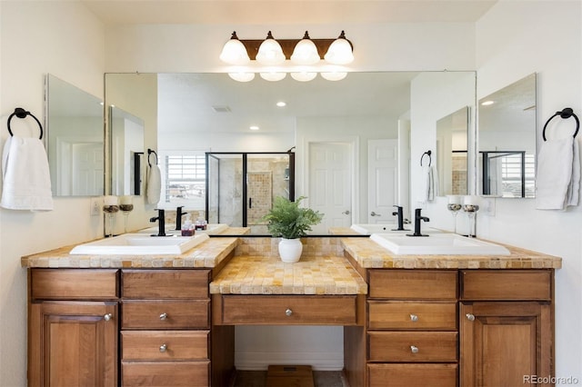 bathroom with vanity, a shower stall, visible vents, and recessed lighting