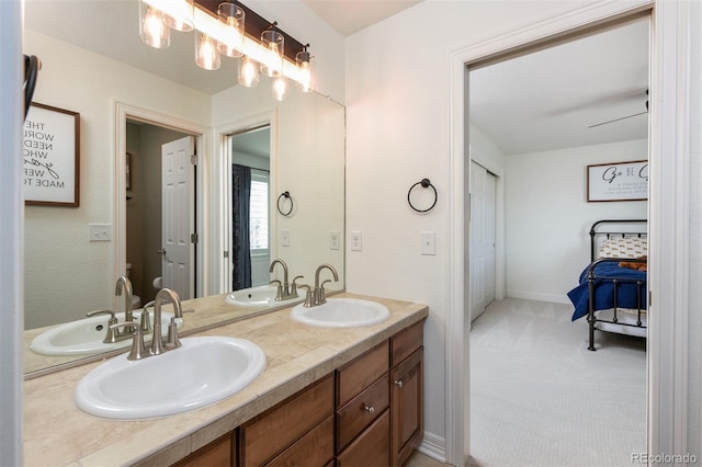 full bathroom featuring a sink and double vanity