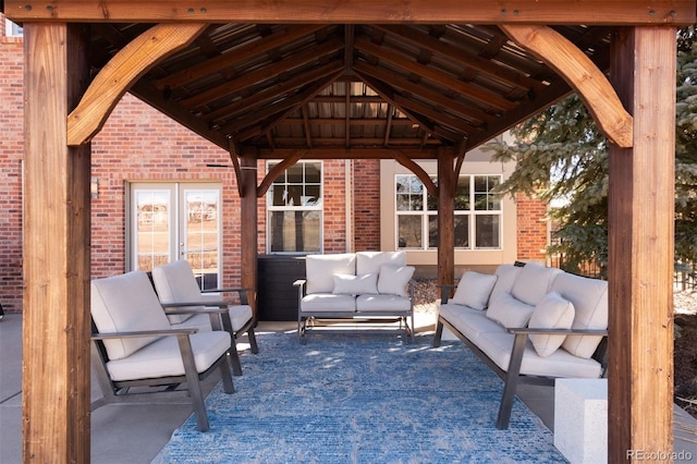 view of patio / terrace featuring an outdoor living space and a gazebo