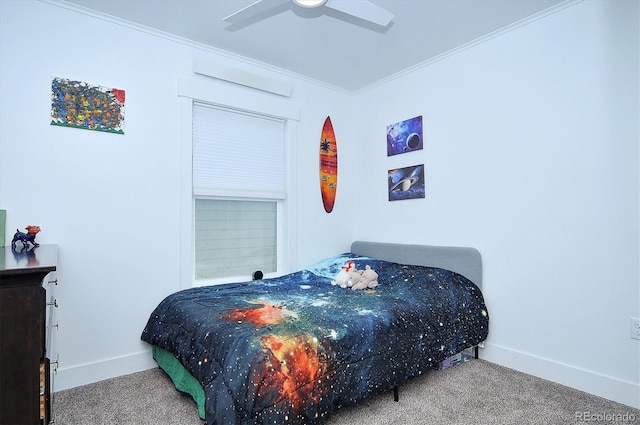 carpeted bedroom with ceiling fan and ornamental molding