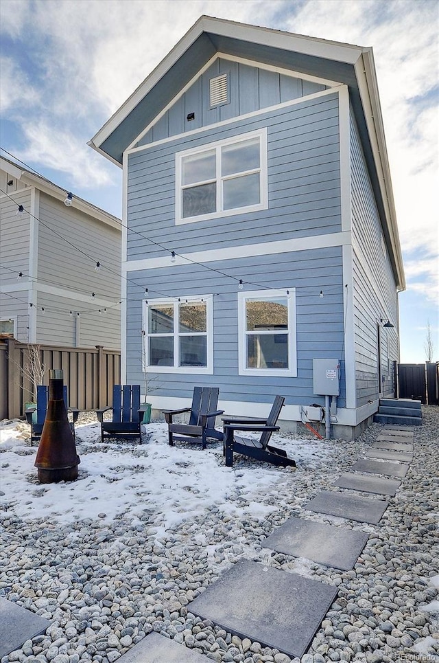 view of snow covered house