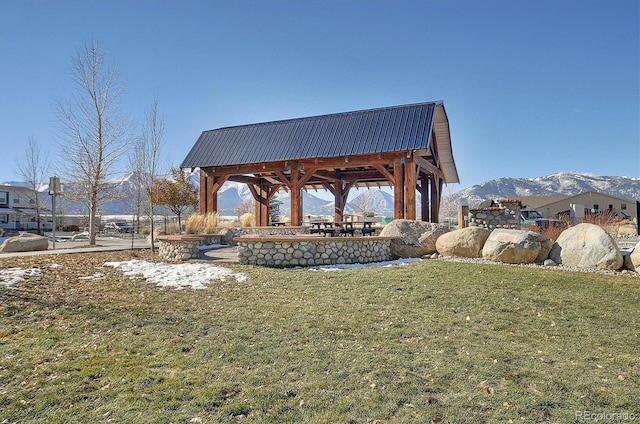 view of yard featuring a mountain view and a gazebo