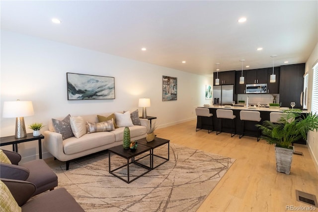 living room featuring light hardwood / wood-style floors