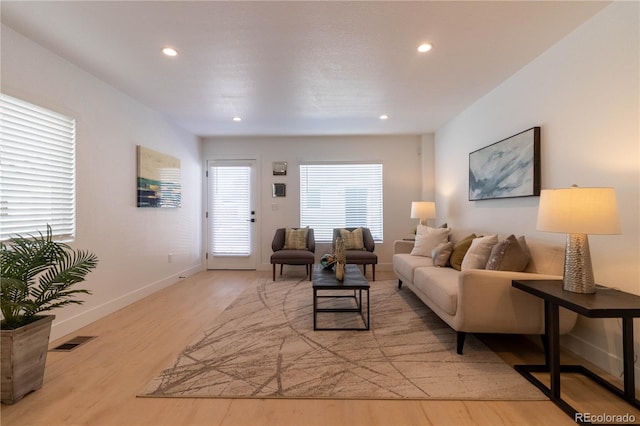 living room with light hardwood / wood-style floors