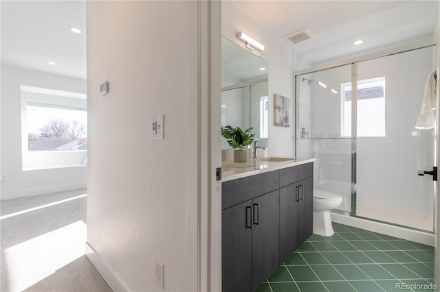 bathroom with vanity, toilet, an enclosed shower, and tile patterned flooring