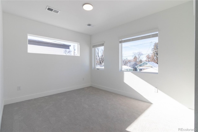 view of carpeted spare room