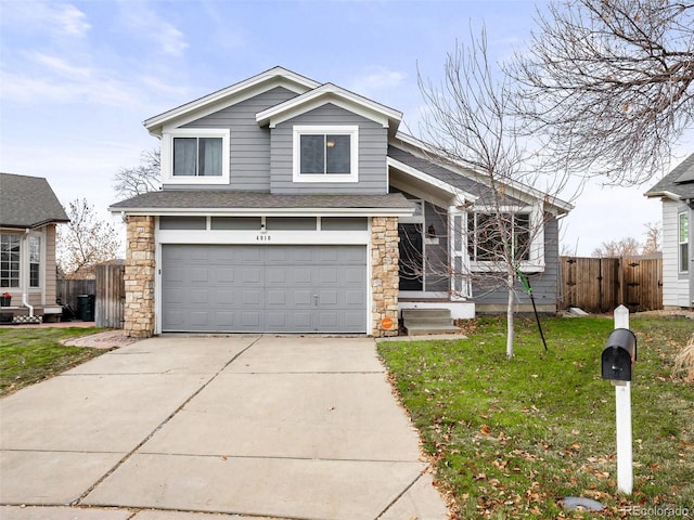 view of front of property featuring concrete driveway, stone siding, an attached garage, fence, and a front lawn