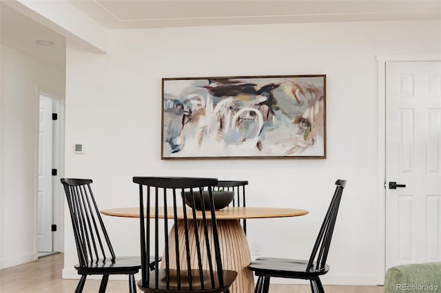 1617 S Quitman St, Denver, CO 80219 - dining area featuring wood finished floors and baseboards