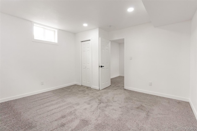1617 S Quitman St, Denver, CO 80219 - below grade area with carpet, recessed lighting, and baseboards