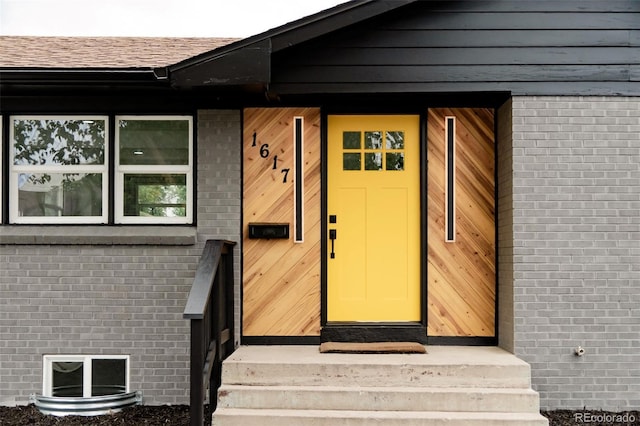 1617 S Quitman St, Denver, CO 80219 - entrance to property with brick siding