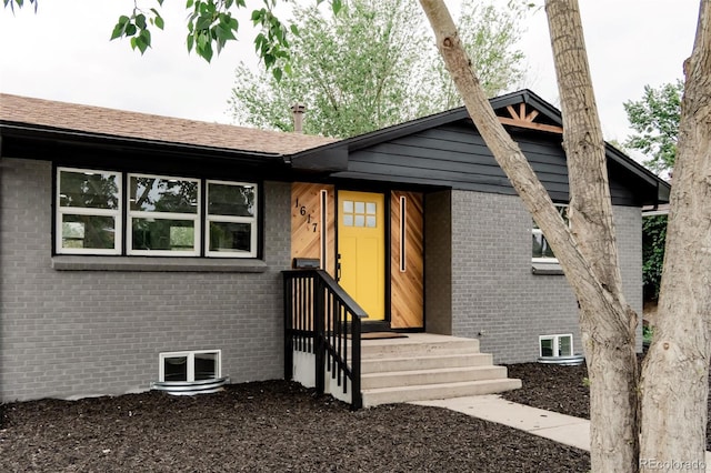 1617 S Quitman St, Denver, CO 80219 - view of front of property featuring brick siding