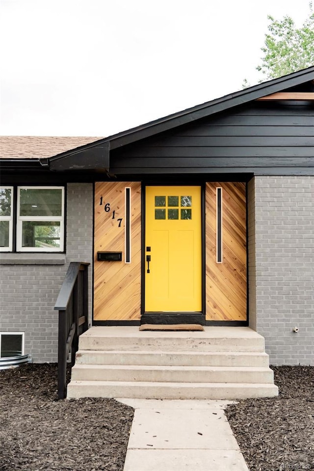 1617 S Quitman St, Denver, CO 80219 - entrance to property with brick siding