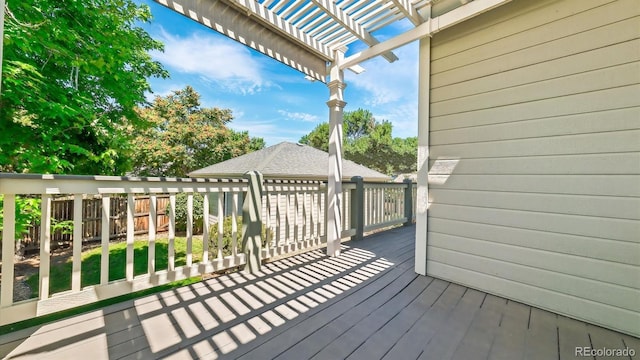 wooden deck with a pergola