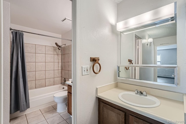 bathroom with toilet, shower / tub combo, visible vents, vanity, and tile patterned floors