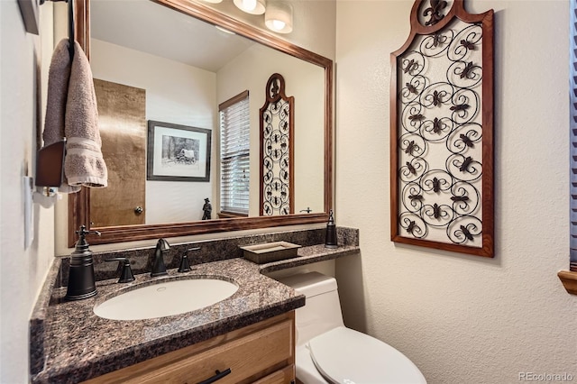 9791 Sterling Dr, Highlands Ranch, CO 80126 - half bathroom featuring toilet and vanity