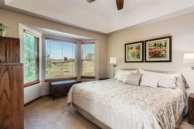 9791 Sterling Dr, Highlands Ranch, CO 80126 - carpeted bedroom with baseboards and a ceiling fan