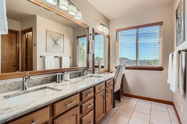 9791 Sterling Dr, Highlands Ranch, CO 80126 - full bath with double vanity and tile patterned floors