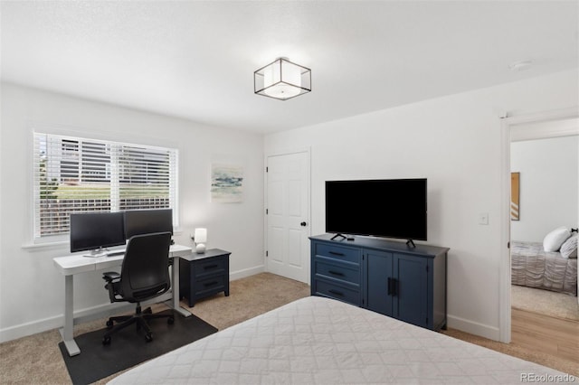 7654 Crestone Peak Trl, Colorado Springs, CO 80924 - bedroom with a desk, baseboards, and carpet floors
